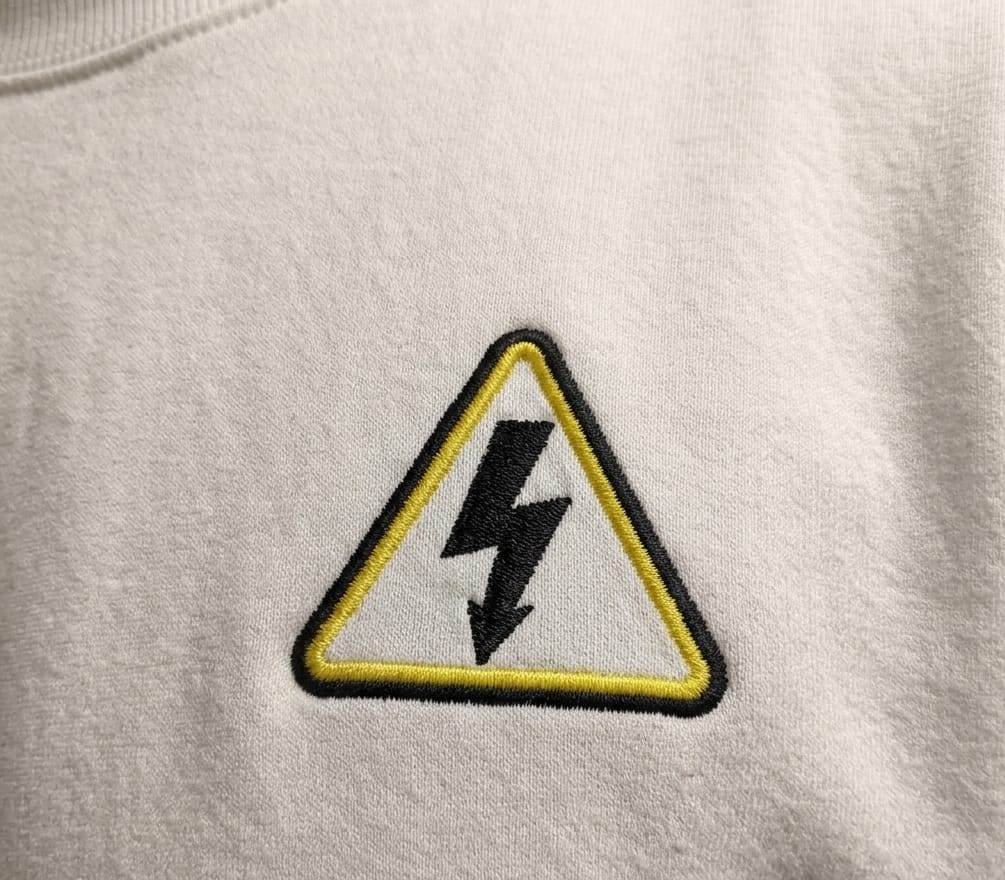 High_voltage_danger_sign_col_1790766779.jpeg